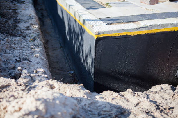 Professional Waterproofing technician working in Alpha, NJ